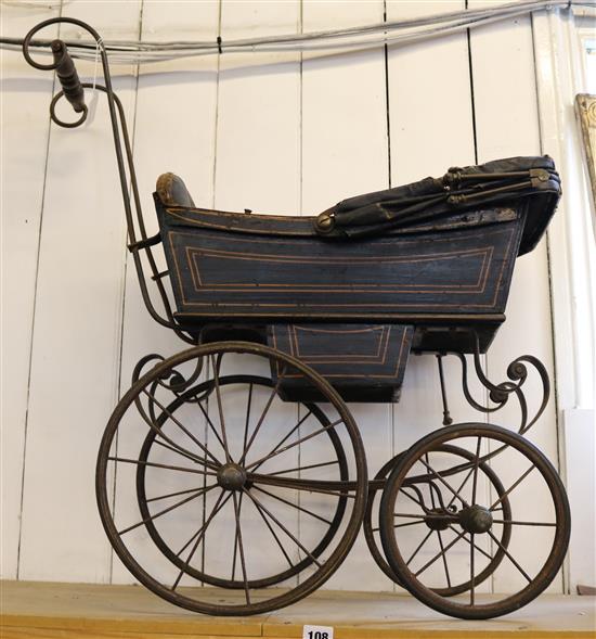 Victorian black-painted two-seat dolls pram